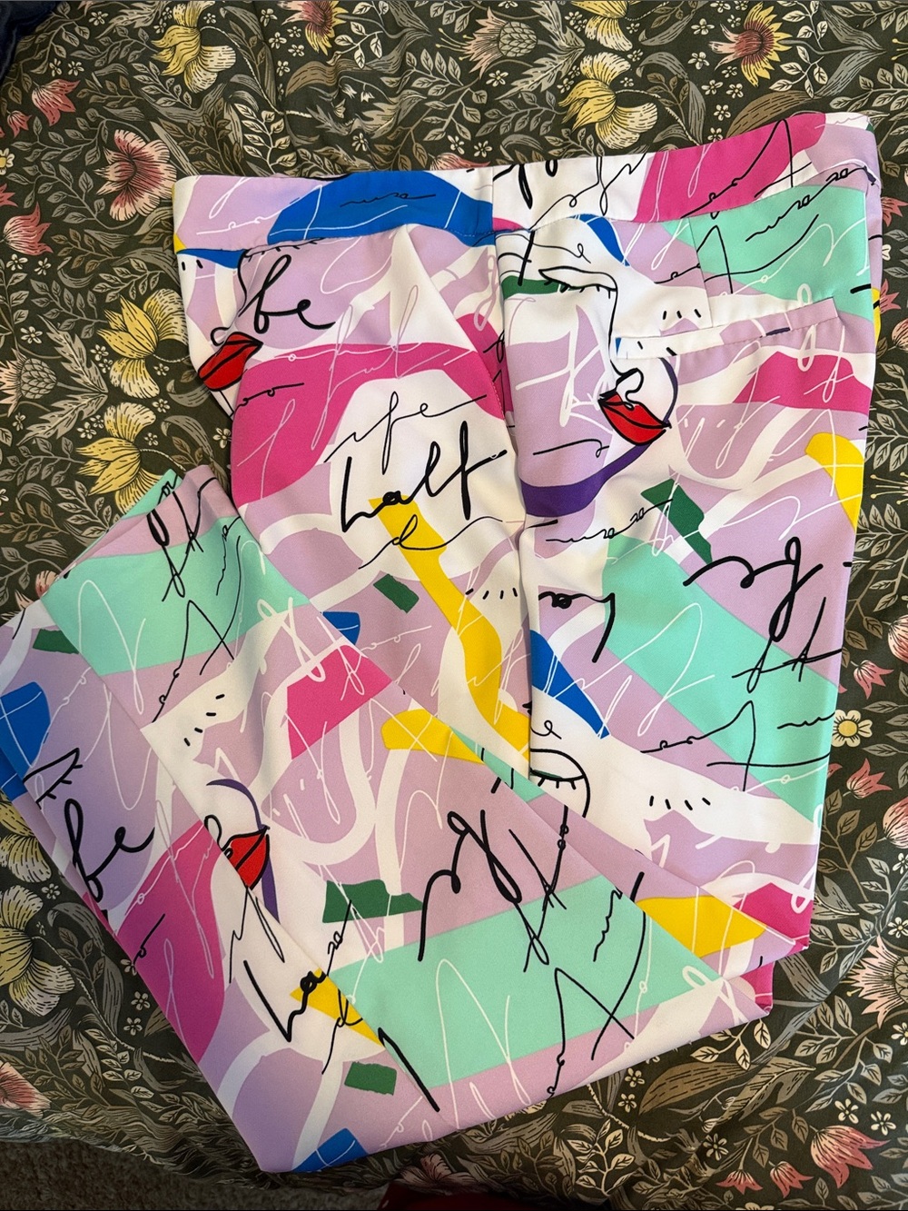 New York & Company Mint Pink Purple Abstract Face Capri pants.